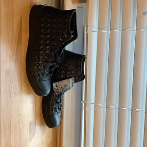 Chuck Taylor hightop Converse.